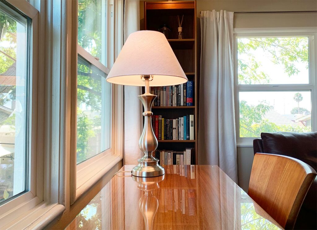 comfortable desk chair and a well-lit desk on which to work