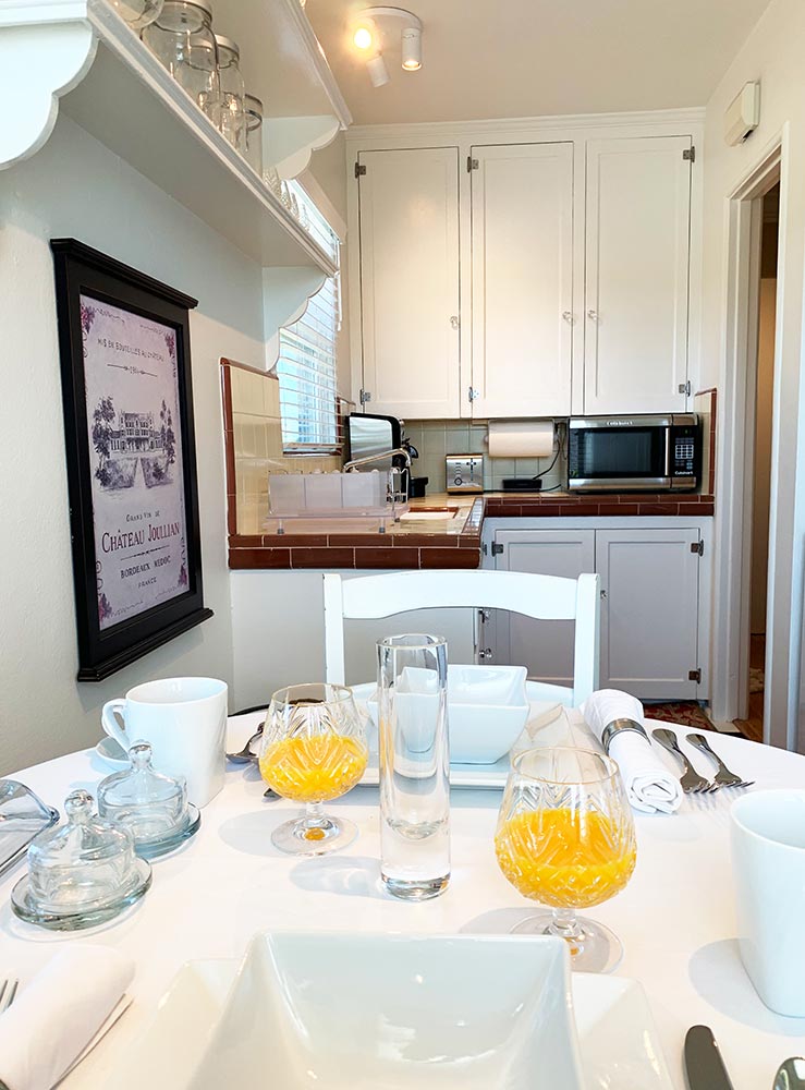 Morning breakfast table off side of bed and breakfast kitchen.